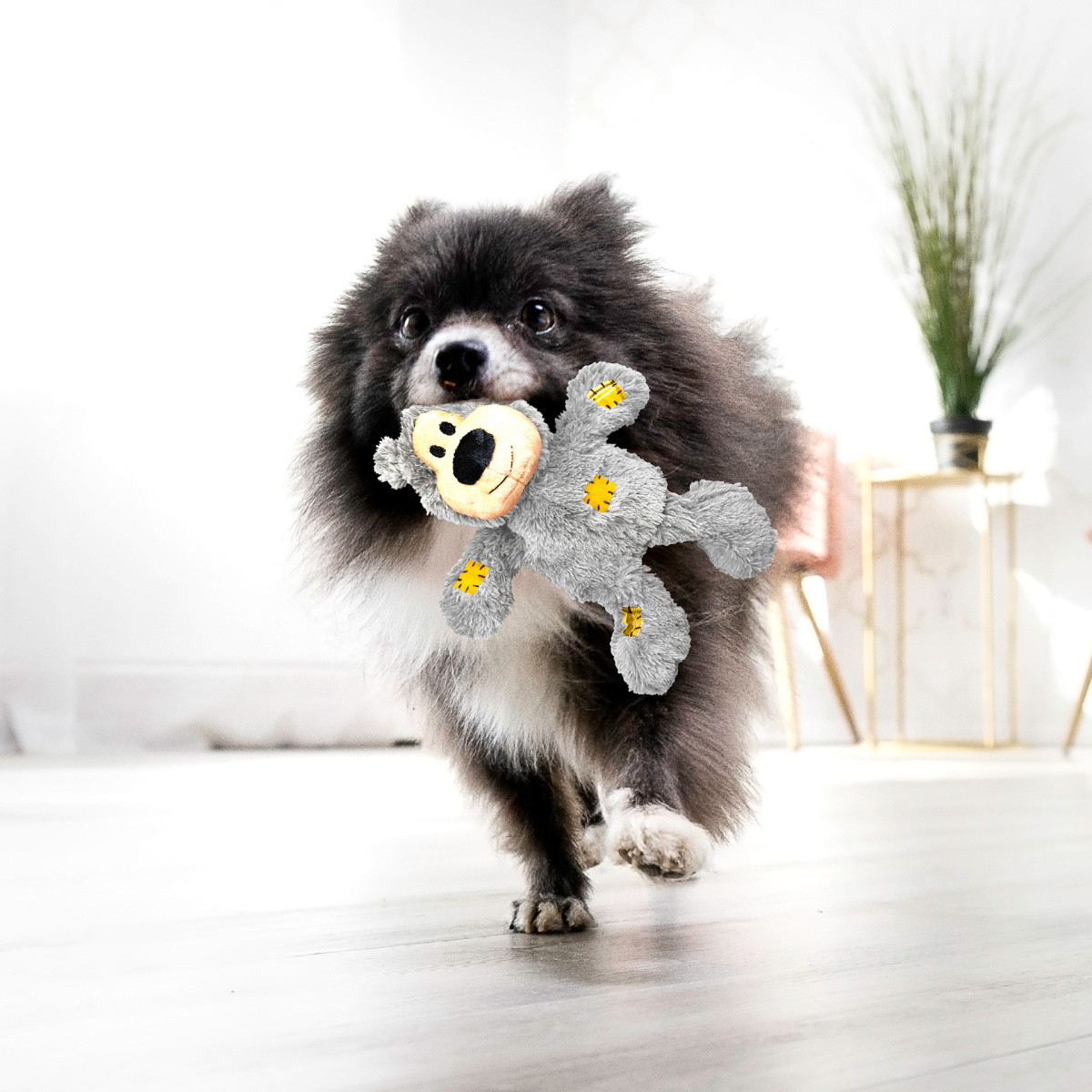 Іграшка для собак Тріскучий Ведмедик KONG Wild Knots Bear